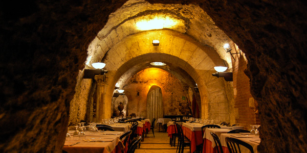 An arcade of Pompey's Theatre forms a basement dining room in Da Pancrazio restaurant