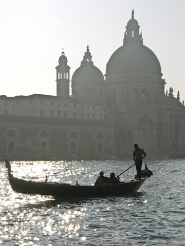 A gondolier in the Grand Canal front of Santa Maria della Salute